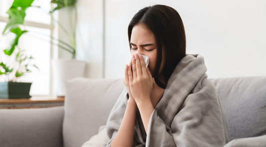 Person with winter sickness on the couch