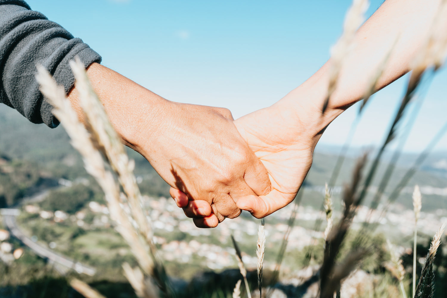 Hands holding each other